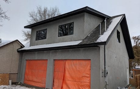 during renovation - garage with loft addition - exterior view