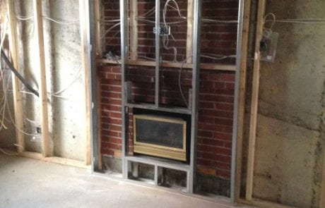 during residential renovation 6th ave - basement fireplace framing