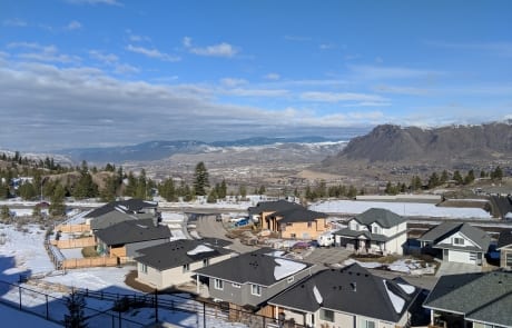 view of hills in winter Kamloops, BC from deck of Custom house