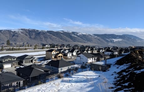 view of hills in winter Kamloops, BC from deck of Custom house