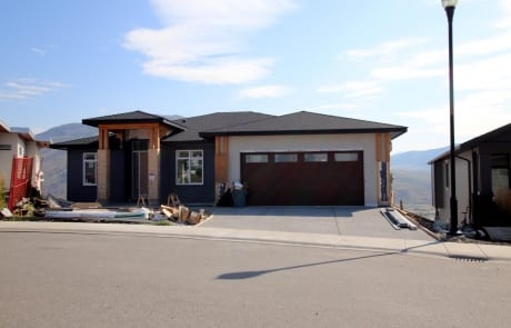 New Custom home view of front of house, siding almost finished